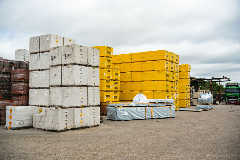 Palletised blocks and kerbs stacked in the yard