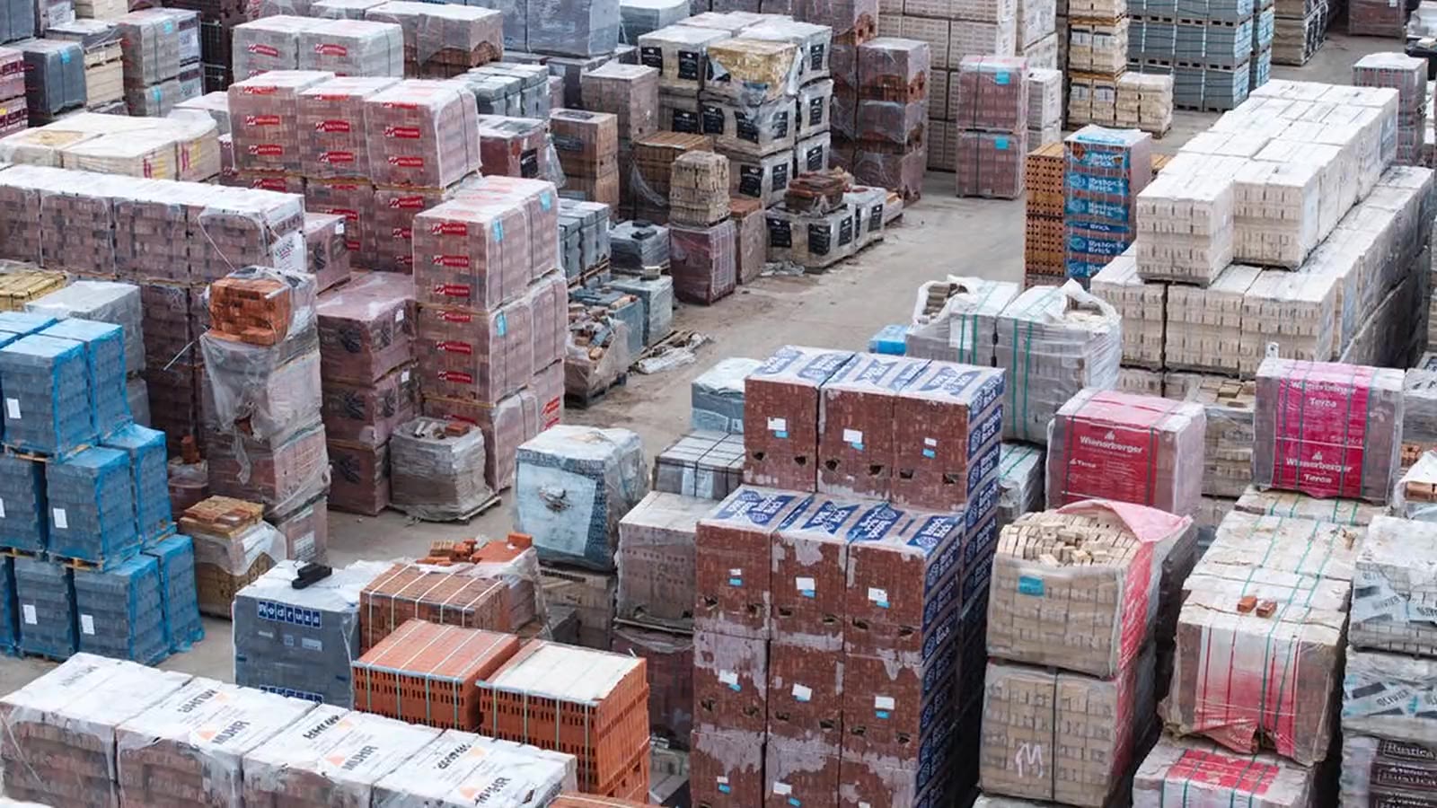 Aerial view over thousands of packs of bricks in the Steward yard at Paddock Wood